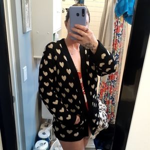 Black sweater with gold hearts